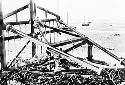 The obstacles, in order from the seaward side, faced by the troops landing on the beaches â€“ a Belgian Gate