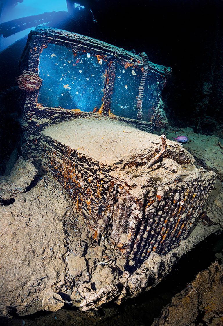 The vehicles of the Thistlegorm, such as the Albion AM463 aircraft-refueller, offer a unique underwater photography challenge and opportunity. Taken with a Nikon D4 and Sigma 15mm. Subal housing. Seacam strobes. 1/25th @ f/11, ISO 800.