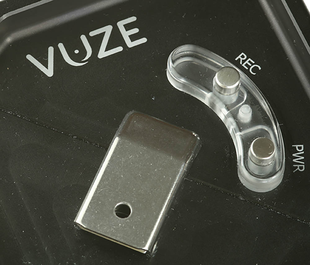 Housing control buttons and top latch.