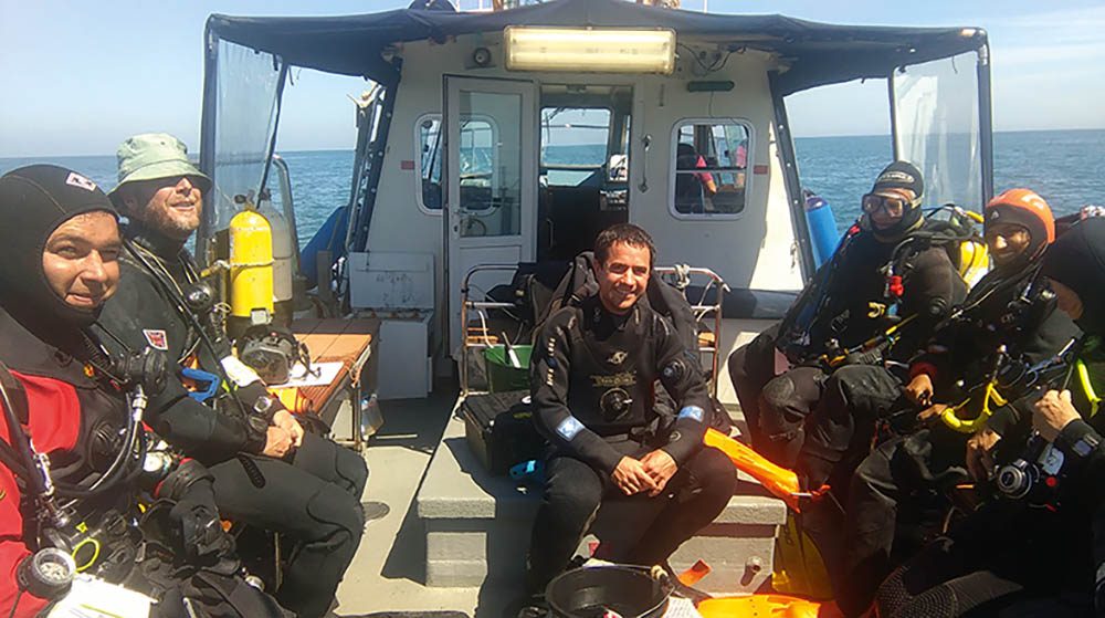 Project divers on the boat.