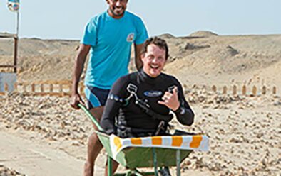 Josh Boggi – Diving to New Depths 3 In Egypt, when a barrow is the most practical way to get Josh and other amputees down to the shore.