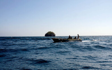 Tender-boat crew look out for divers.