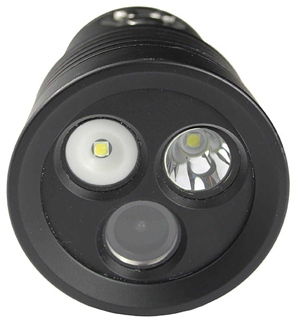 Lamp-head with camera lens bottom centre, flood-beam top left and spot-beam top right.