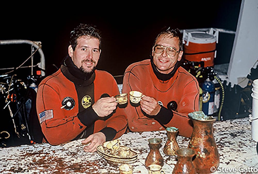 Divers Steve Gatto and Tom Packer in 1990, with china crockery and vases recovered from the Andrea Doria wreck.