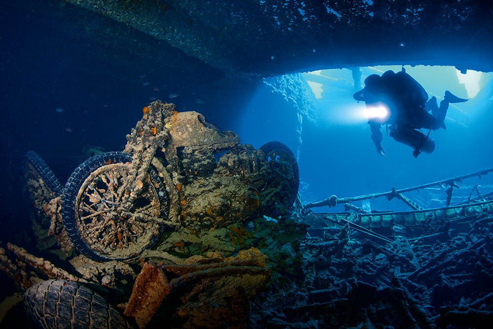 A favorite scene in Thistlegorm with a BSA motorcycle in the first cargo hold. Red Sea, Egypt. Nikon D300, 15mm f5, 1/60, ISO400.