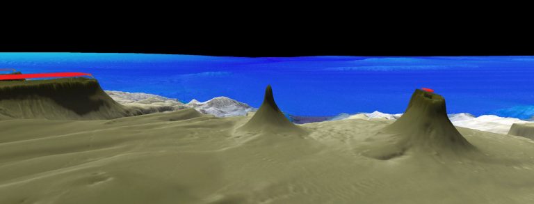 Aan de rechterkant is het nieuw ontdekte, 500 meter hoge, vrijstaande rif te zien. (Foto: Schmidt Ocean Instituut)