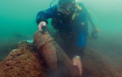 Finds are photographed under water, like this powder case…