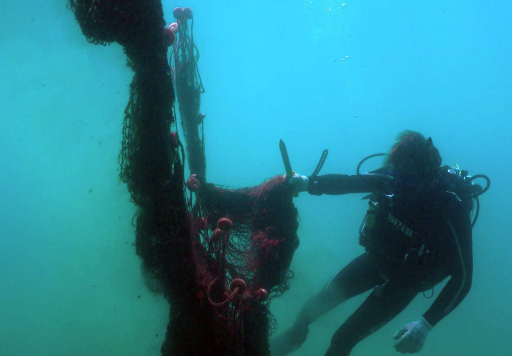 Spanish diver and nets