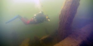 Vrak diver examines one of the wrecks