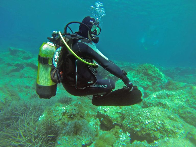 cemetery? diver surveys seabed in Malta