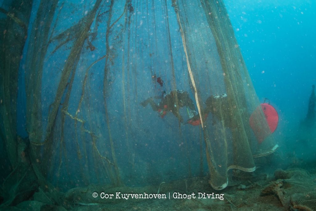 ghost farm divers under net