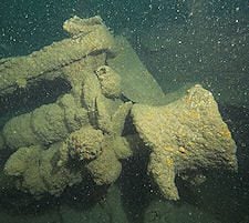 Cargo winch, upside-down in the forward hold.