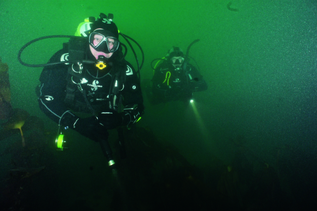 Diving with dry gloves, pee valve and heated vest