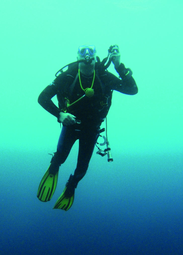 Diver checking above before surfacing