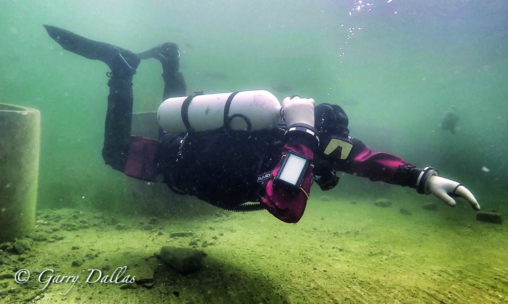 Hover in dry suit to avoid drysuit inversion