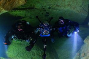 Cave-diver with camera in Ressel