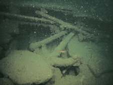 This small anchor is well into the wreckage but was probably fouled on the Vendome since it sank