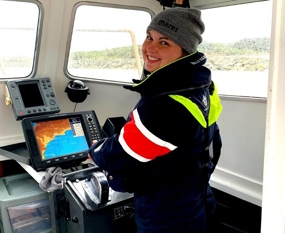 Clare Dutton at the helpm – she is an RYA Advanced Instructor Skipper