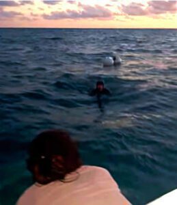 The moment the missing freediver is spotted from his family's boat