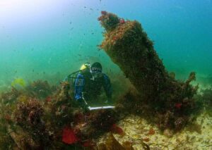 Working on the 18th-century HMS Colossus dive trail in the Isles of Scilly (CISMAS)