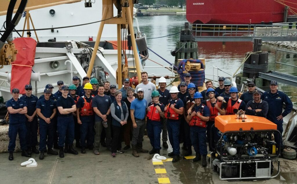 June 2021 expedition team on USCGC Mobile Bay with the ROV (Ocean Exploration Trust / NOAA Thunder Bay National Marine Sanctuary)
