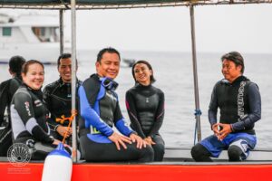 Tourism secretary Frasca second from right on the LLV Divers boat (Department of Tourism)