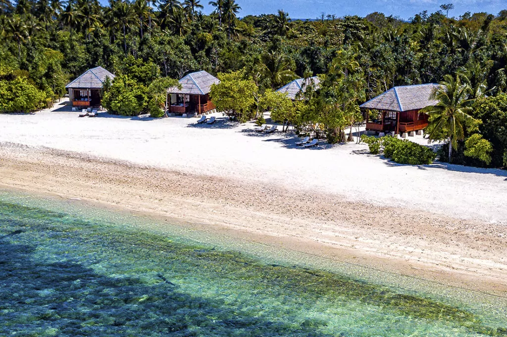 Wakatobi’s New Turtle Beach Bungalows 1 Wakatobi's Turtle Beach Bungalows sit on a more secluded section of the resort’s property offering a scenic view of a white sand beach and ocean beyond.