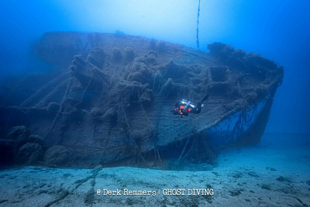 Wreck draped in ghost-net requiring removal (Derk Remmers)