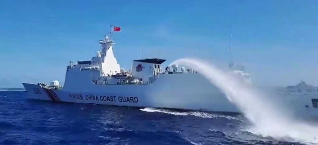 China Coast Guard boat deploys water cannon (Philippine Coast Guard)