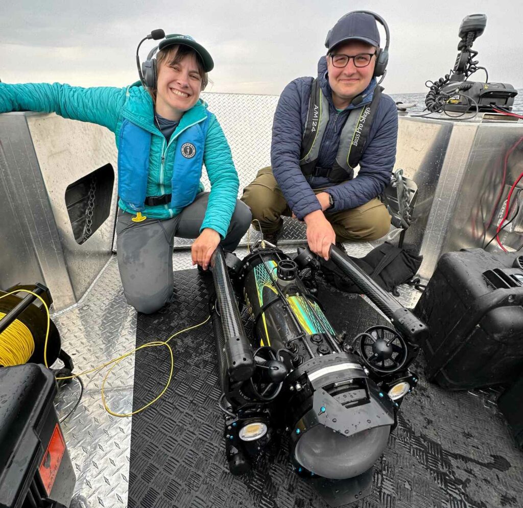 Yvonne Drebert & Zach Melnick with their Boxfish Luna ROV after finding the wreck (Inspired Planet)