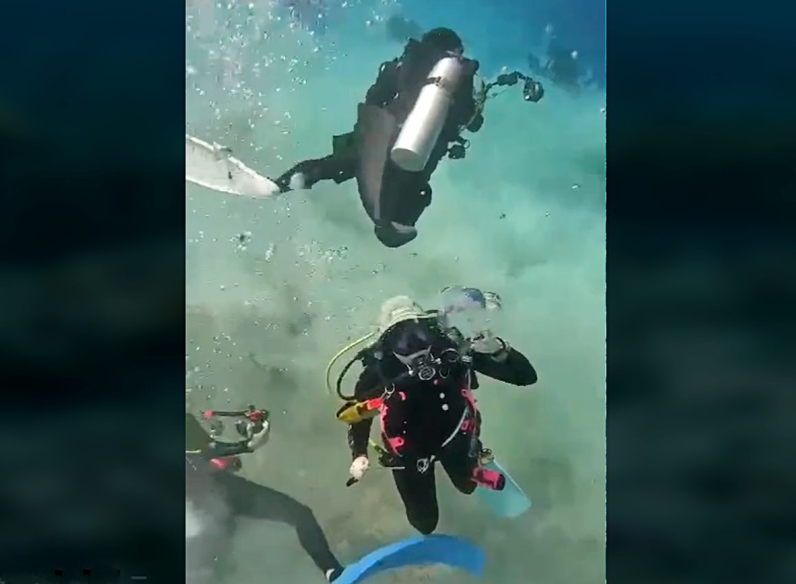 Caught on camera: divers rocked by earthquake