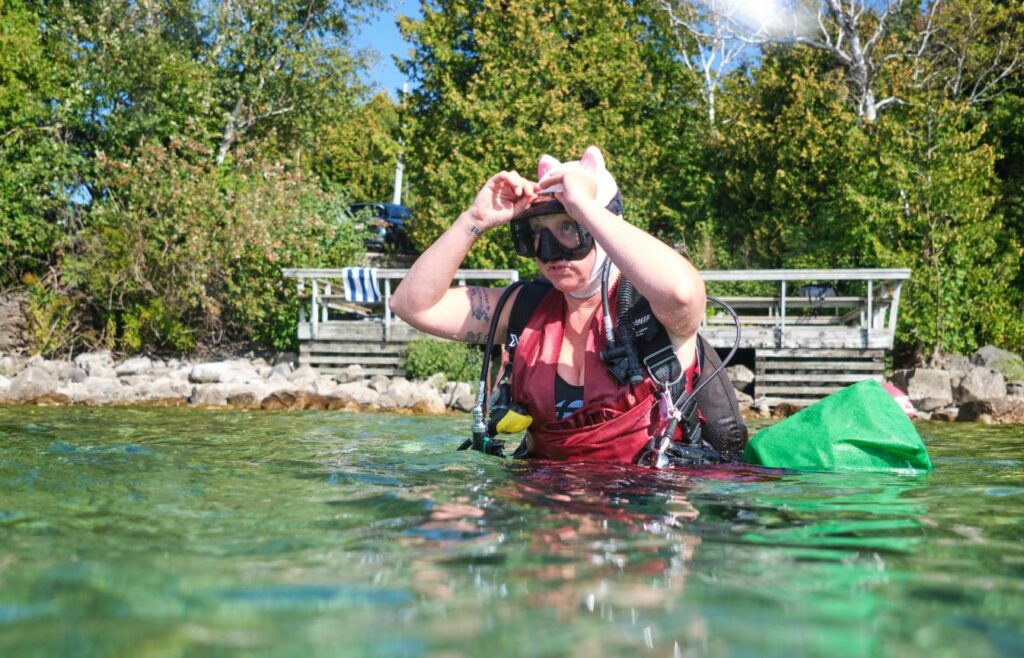 Mareesha Klups gets used to going without an exposure suit on a practice dive