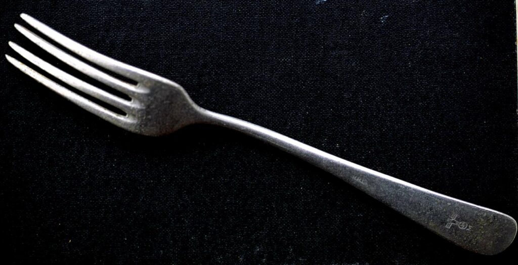 Remarkably preserved, a crew-member’s fork with swastika emblem on the handle (Vasilis Mentogiannis)