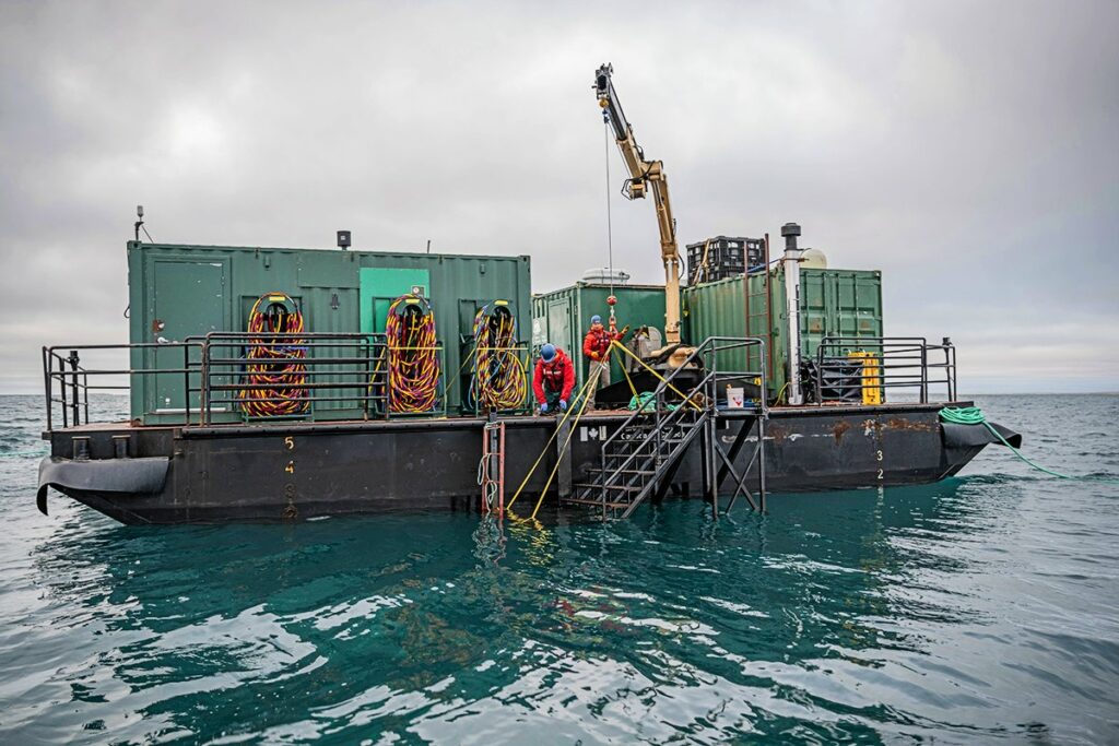 Preparation work aboard Parks Canada’s diving and excavation support barge Qiniqtiryuaq (Brett Seymour / Parks Canada)