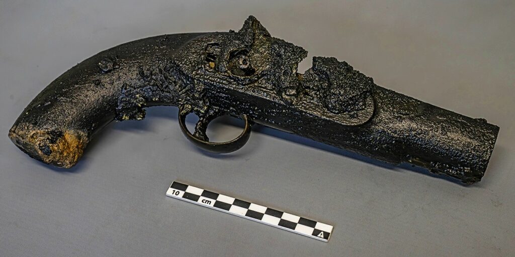 Royal Navy pistol recovered from a seamen’s chest (Brett Seymour / Parks Canada)