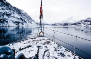 Royal Navy destroyer HMS Quorn makes her way through the ice-cold waters of Kaafjord in search of X5