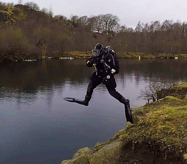 A BTS diver makes a giant stride entry