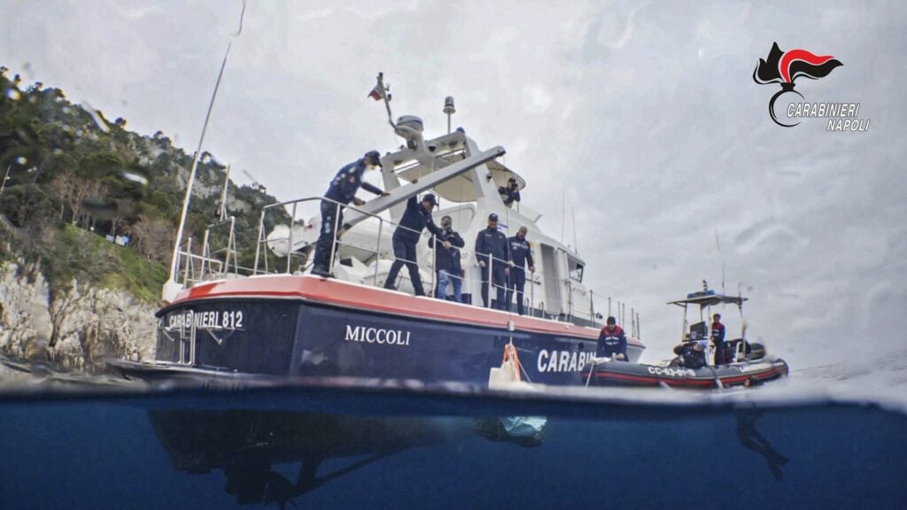 The operation is conducted from a police boat