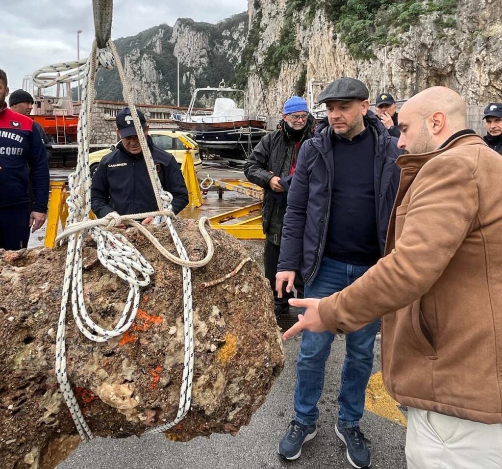 The worked block is brought ashore
