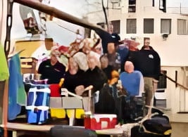 Expedition team preparing for a dive on the Graf Zeppelin aircraft carrier wreck in the Baltic Sea