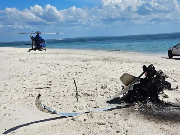 Burnt-out wreckage of the gyroplane on the beach (LifeFlight)
