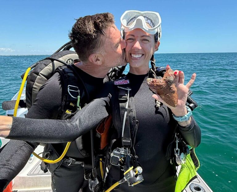 Kristina Scott and Chris Tidwell with the meg tooth