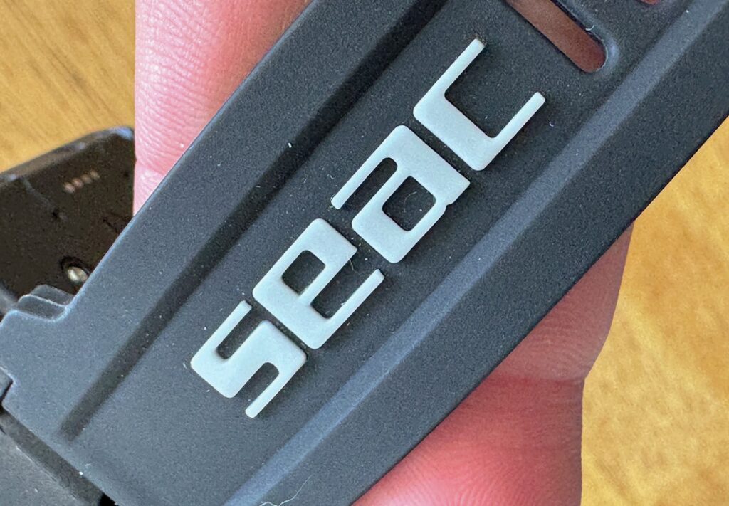 Seac Tablet Dive Computer Review: Air-Integrated LCD Dive Computer with Nitrox Support 3 Close-up of Seac Tablet dive computer strap showing Seac logo branding detail.