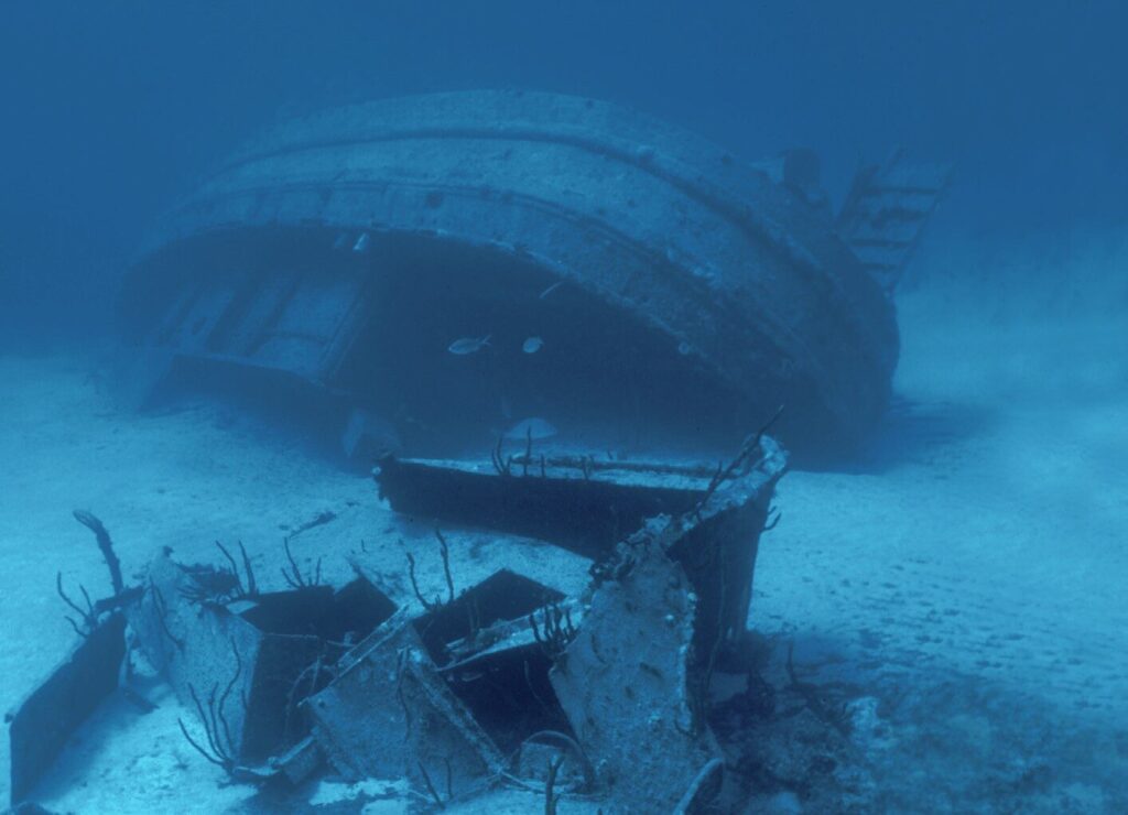 Shore Diving Cayman Brac: The Ultimate Guide to the Caribbean’s Best Dive Sites 1 The upturned wreck of the Kissimmee off Cayman Brac