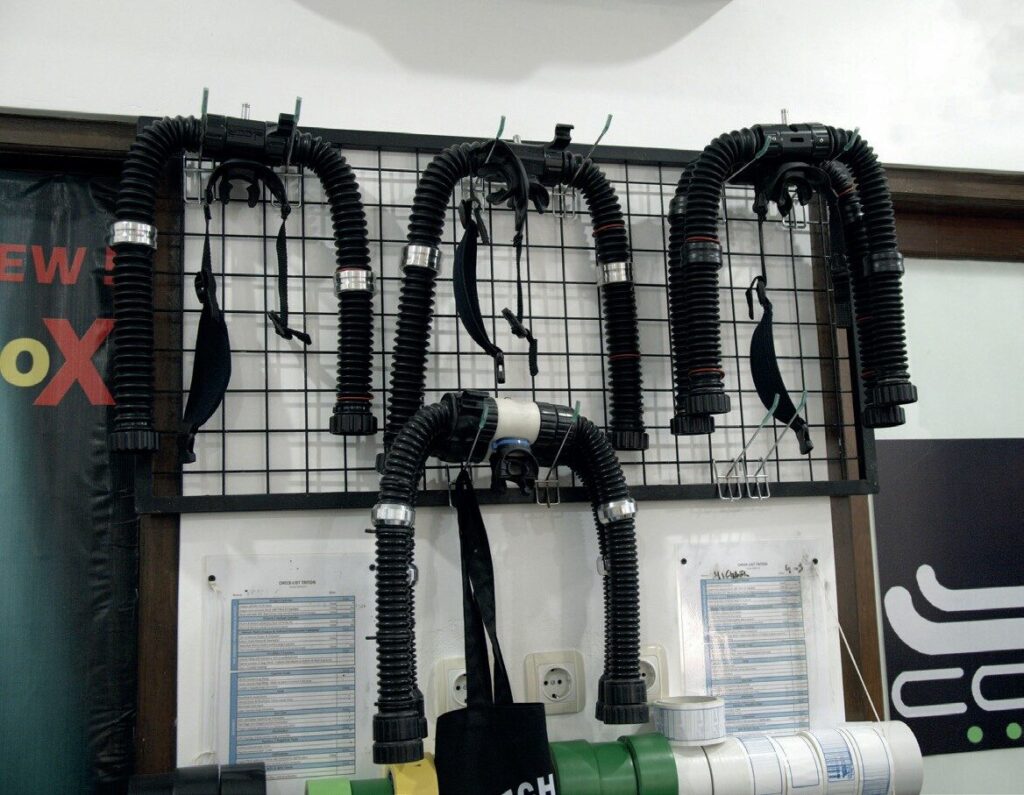 Entering the World of Closed Circuit: My Journey into CCR Diving and Rebreathers 2 Assorted CCR diving parts ready for assembly