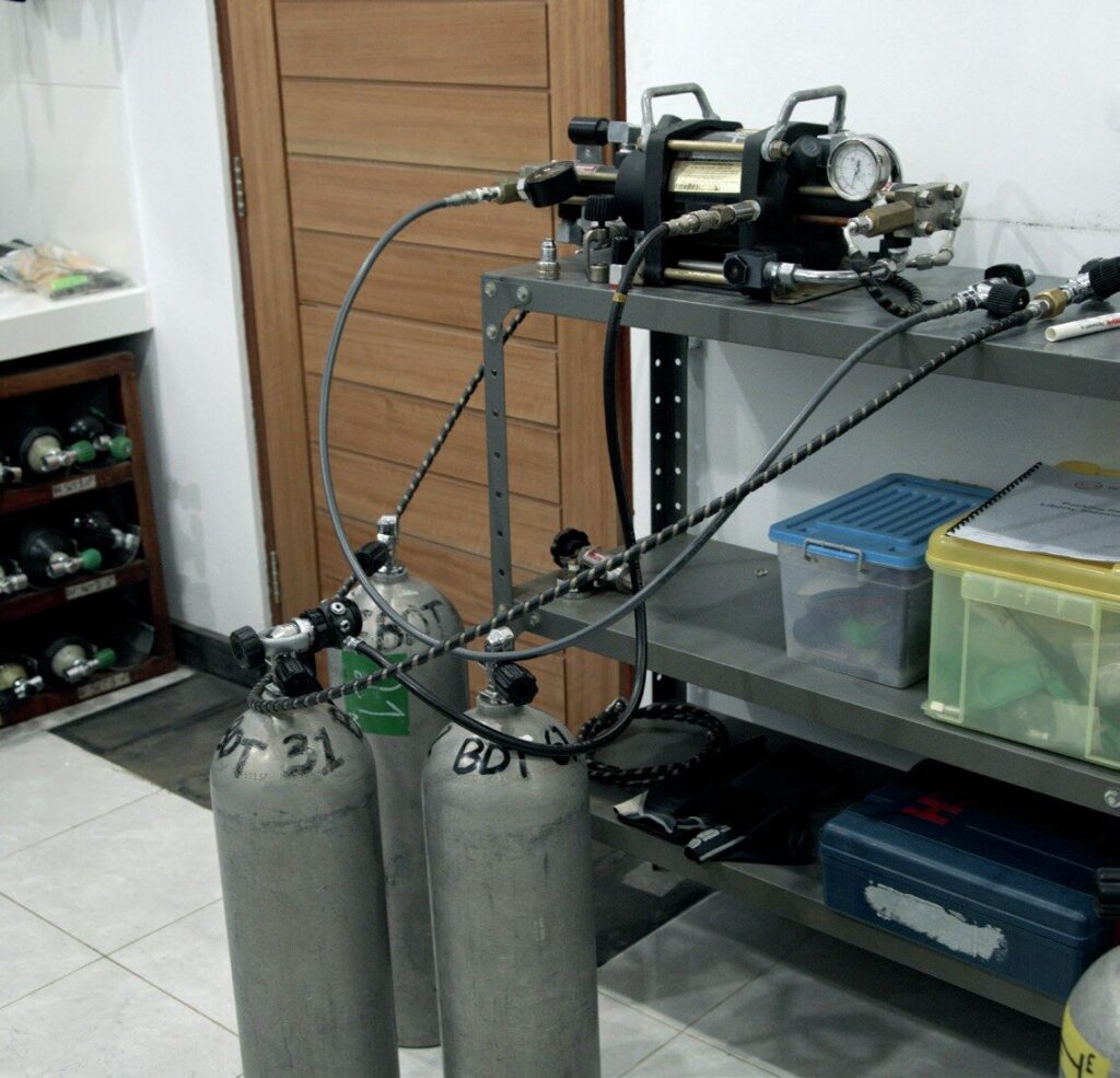 Entering the World of Closed Circuit: My Journey into CCR Diving and Rebreathers 3 Filling oxygen tanks for rebreather setup