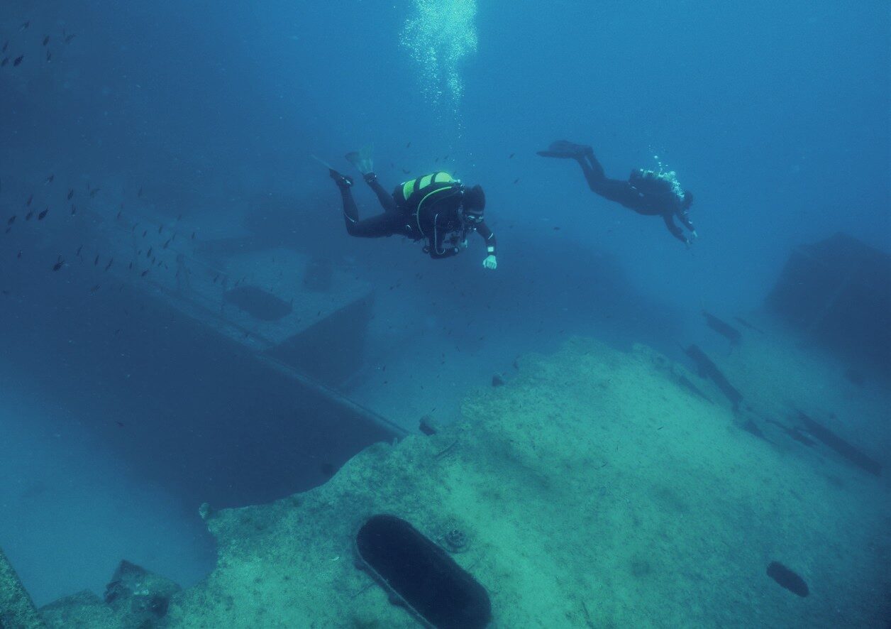 Diver exploring HMS Maori World War II wreck at 16m in Valletta, Malta