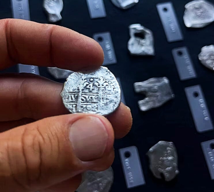 A cleaned-up silver piece of eight (Queens Jewels)