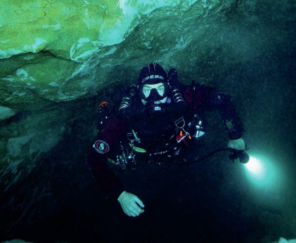 Beyond the Data: The Soggy Wombats’ New Discovery in Pines Cave, Mount Gambier 7 Josh returning through the cave system
