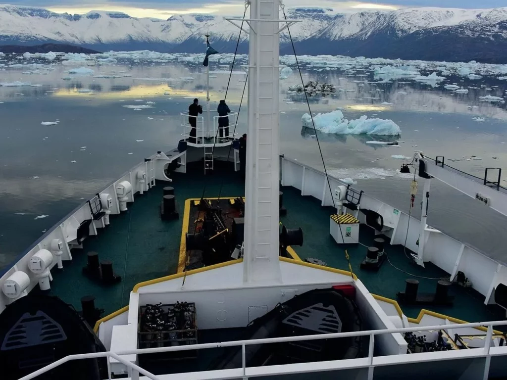 Iceberg Diving in Greenland: Beauty, Danger and Essential Safety Protocols 2 The frozen wilderness of Greenland from an icebreaker